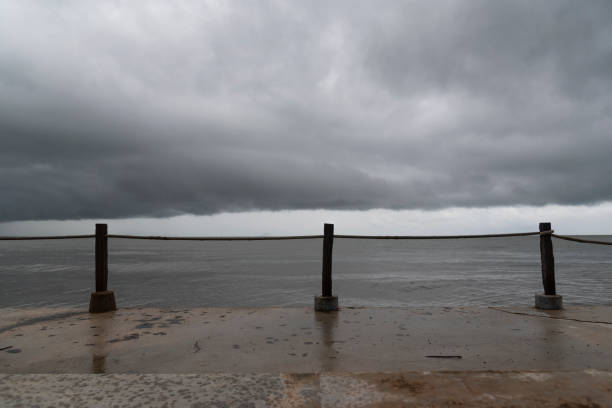 giant depression hurrican storm cloud on the sky at tropical tourism beach, thailand . - hurrican imagens e fotografias de stock