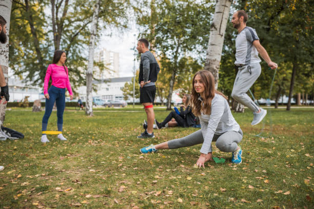 istock Fitness group exercising outdoors 1287035208