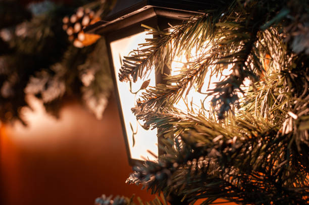 istock Luminous lantern, Christmas garland, copy space 1287036369
