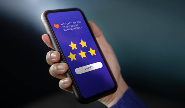 istock Customer Experiences Concept. Woman Using Mobile Phone to Giving Feedback via the Internet. Positive Review. Friends Recommended. Client Satisfaction Surveys 1287038762