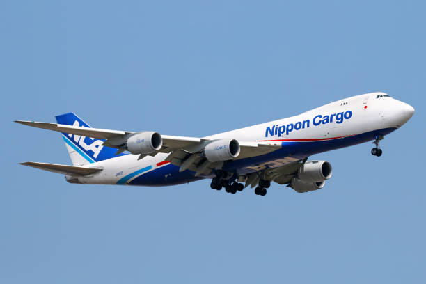 NCA - Nippon Cargo Airlines aircraft A Boeing 747-8F freigther operated by NCA (Nippon Cargo Airlines) lands in Shanghai Pudong airport. nippon cargo airlines photos stock pictures, royalty-free photos & images