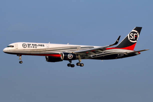 SF Express aircraft A Boeing 757 freigther operated by express courier SF Airlines (SF Express) lands in Shanghai Pudong airport. boeing 757 stock pictures, royalty-free photos & images