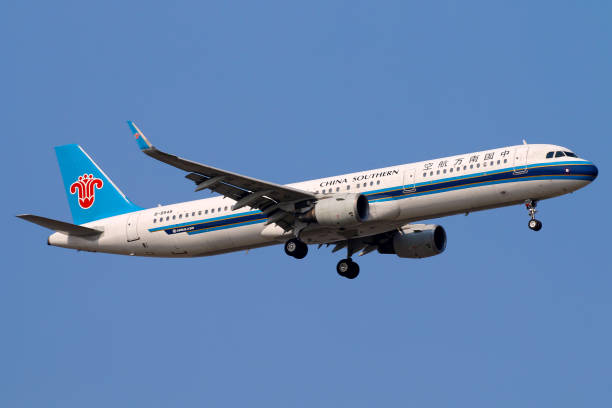 An Airbus A321 operated by China Southern Airlines lands in Shanghai Pudong airport.