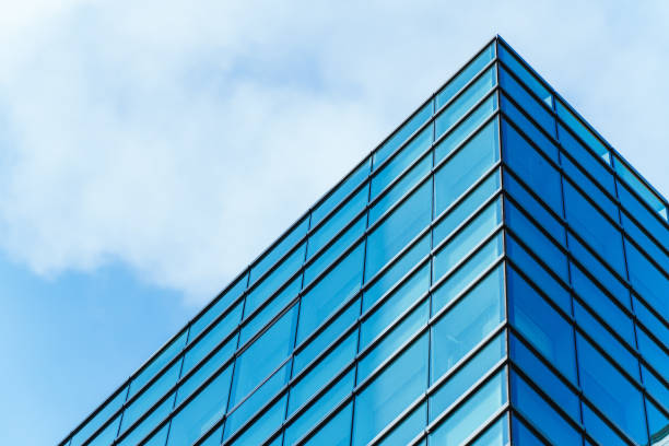 istock underside panoramic and perspective view to steel blue glass high rise building skyscrapers, business concept of successful industrial architecture 1287044517