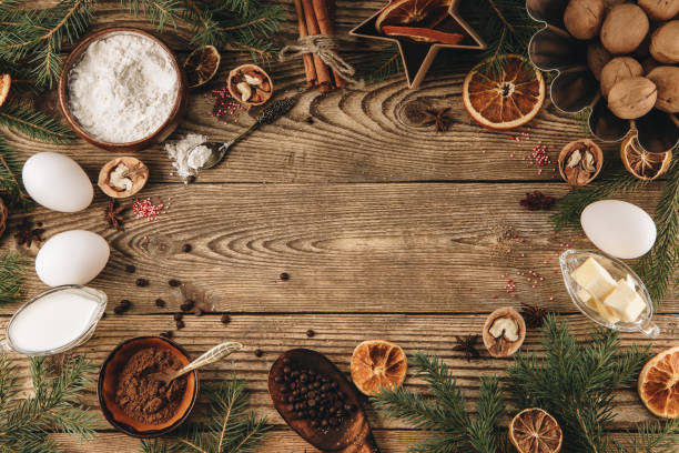istock Ingredients for making christmas cupcake on wooden background, top view, free space for text 1287046076