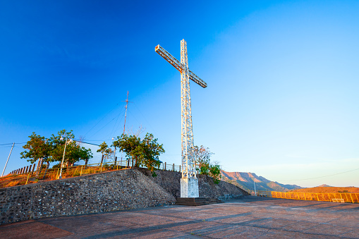 The cross on the Mount Tapyas summit in Coron town, Busuanga island in Palawan province in Philippines
