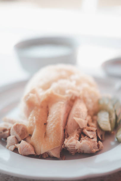 istock Hainanese chicken rice or steamed chicken rice in white dish 1287047352