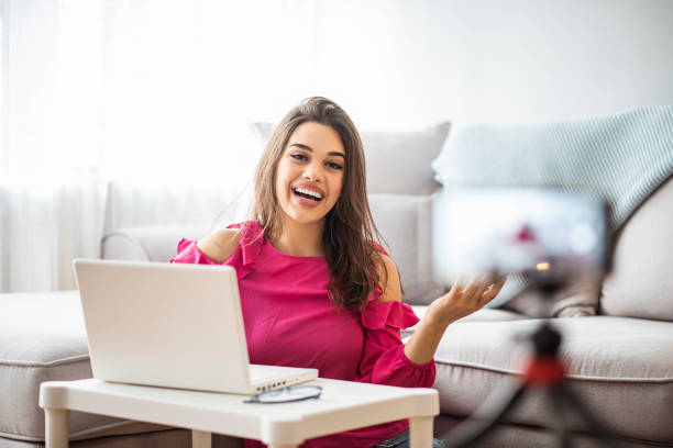 istock Young beautiful woman recording content for her vlog 1287048590
