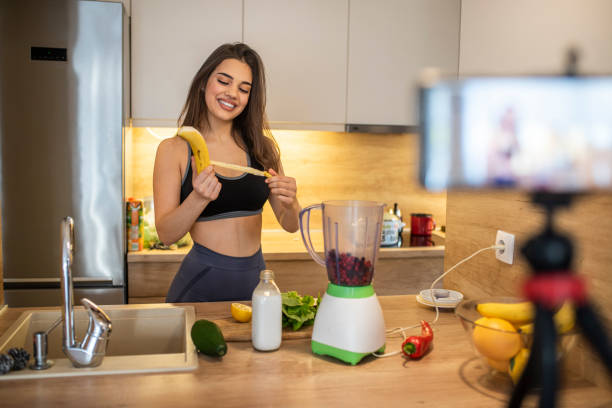 istock Woman explaining how to eat healthy in a vlog. 1287048646
