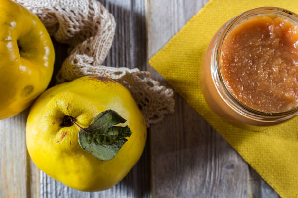 istock Quince on wooden background. Selective focus. 1287052301