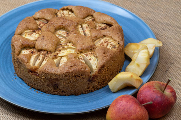 istock Freshly baked apple pie on a blue plate. 1287053674