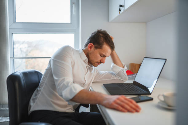 istock Caucasian Businessman Falling a Sleep in an Office 1287054233