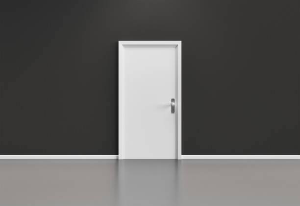 istock Grey wall with closed white door and shiny floor 1287055027