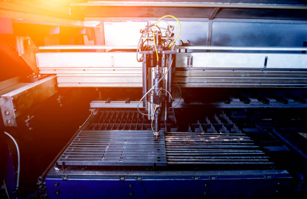 istock The laser cutting machine cutting the holes on pipes 1287058844