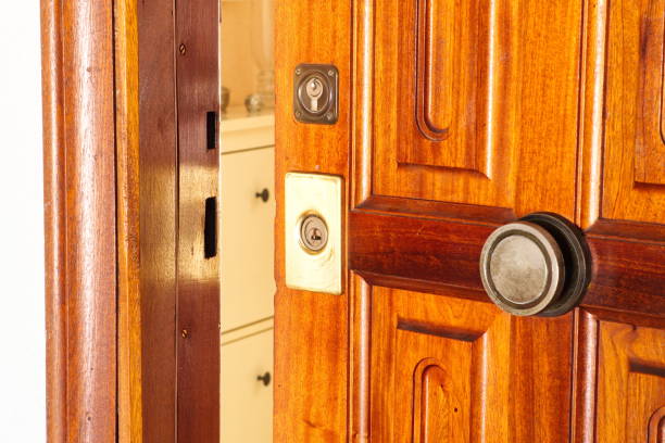 istock Old wooden door with metal lock 1287063950
