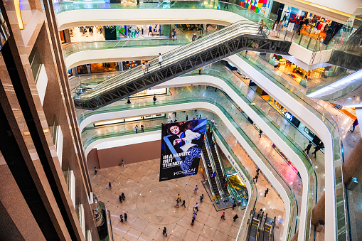 HONG KONG - MARCH 19, 2013: Times Square shopping mall interior. Times Square is a shopping centre and office tower complex in Causeway Bay, Hong Kong in China.