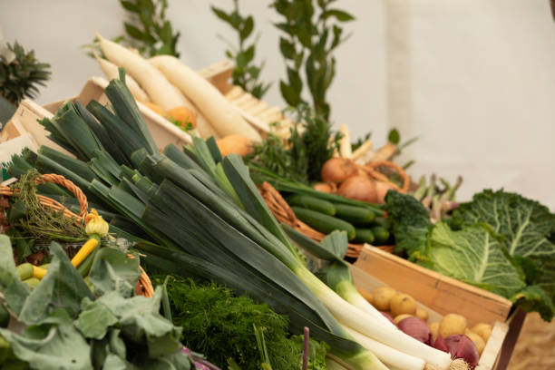 view of a market stall with vegetables stock photo