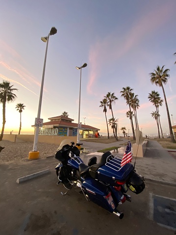 Marina Del Rey, USA - January 03, 2020:  Harley Davidson motorcycle parked on Dockweiler State Beach