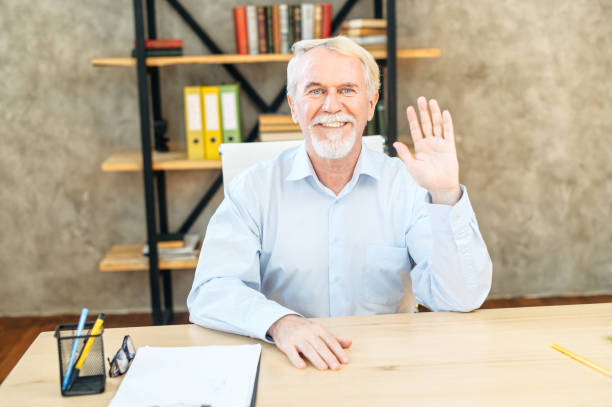istock Senior grey haired man in smart casual wear 1287074732