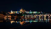 Charles Bridge and St. Vitus Cathedral at night in Prague
