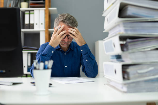 istock Unhappy Tired Sad Employee 1287081458