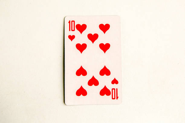 istock Ten of Hearts playing card, white background. 1287081672
