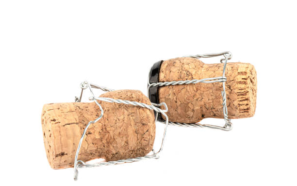 istock Champagne corks with muselis isolated on white background. 1287085645