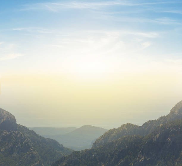 istock mountain valley at the early morning, mountain sunrise background 1287088077
