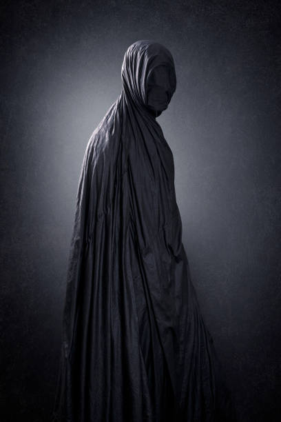 istock Ghostly figure in the dark 1287088282