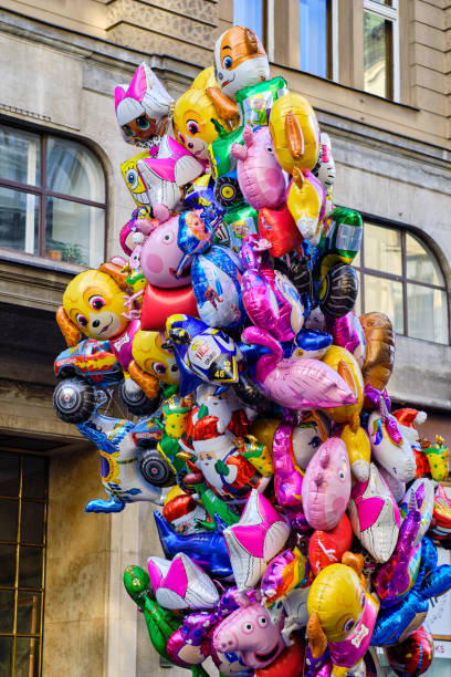 Helium balloons in Knez Mihailo pedestrian street in central Belgrade, Serbia Belgrade / Serbia - January 1, 2020: Colorful helium filled balloons in Knez Mihailo pedestrian street in central Belgrade, Serbia winnie the pooh photos stock pictures, royalty-free photos & images