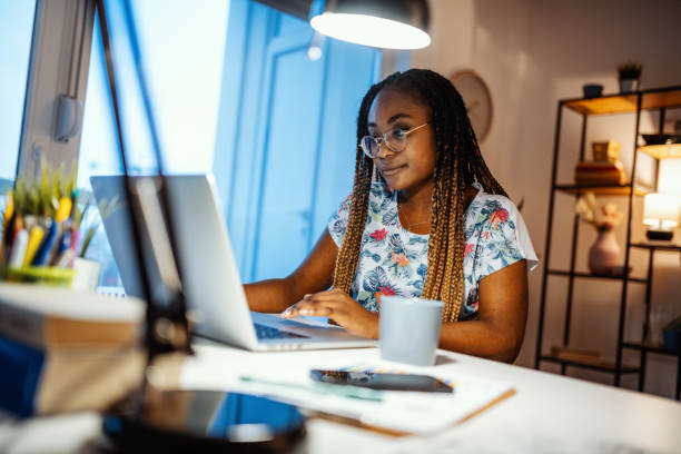 istock African businesswoman working from home during lockdown 1287093910