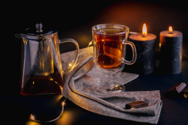 istock Transparent glass teapots with tea on the glass 1287094104