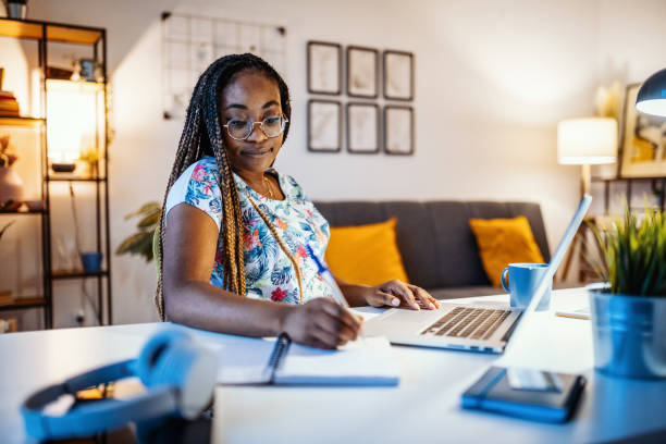 istock African-American businesswoman working from home during lockdown 1287094236