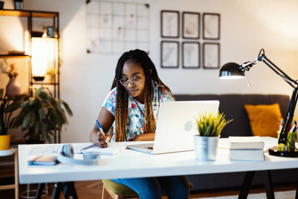 istock African-American student attending online lectures during covid-19 pandemic 1287095010