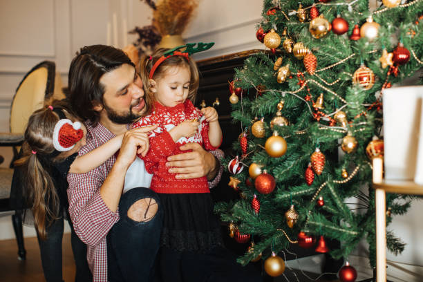 istock Family at home at Christmas time 1287097965