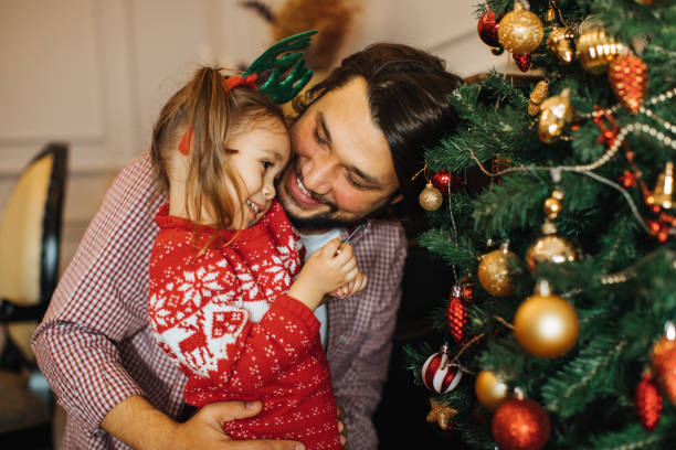 istock Family at home at Christmas time 1287098720
