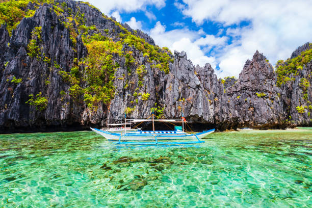 istock Bangka boat in El Nido, Philippines 1287100252