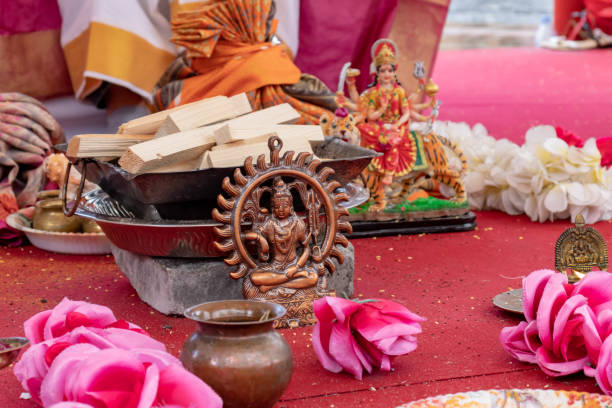istock Different traditional accessories for indian wedding ceremony on white background with flowers 1287100508