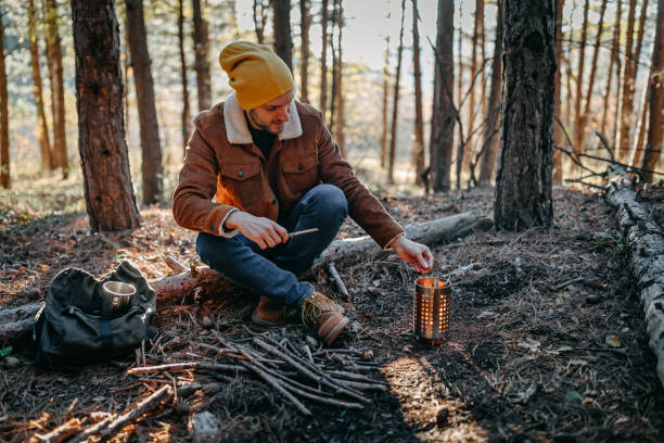 istock Young man camping alone on beautiful autumn day 1287100631