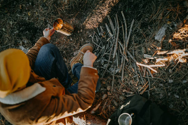 istock Young man camping alone on beautiful autumn day 1287100683