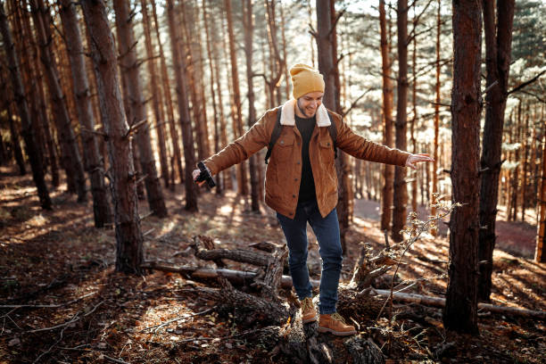 istock Young vlogger enjoying sunny autumn day on mountain 1287101393