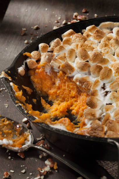 istock Sweet Potato Casserole with Pecans and Marshmallows 1287109068