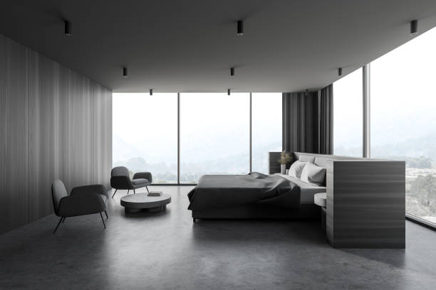 istock Modern panoramic wooden and gray master bedroom corner with armchairs 1287109282
