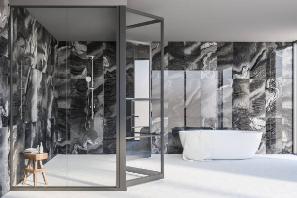 istock Modern white black bathroom interior with tub and shower 1287109876