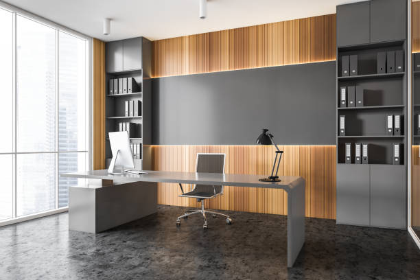 istock Gray and wooden panoramic CEO office corner 1287109903