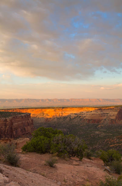 istock Golden sunset light falls on rock formations at Colorado National Monument 1287110168