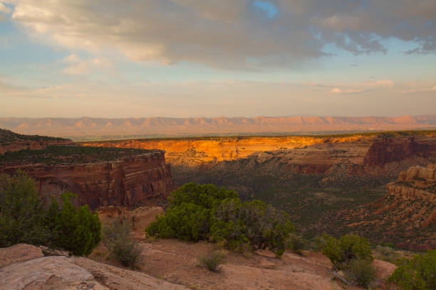 istock Golden sunset light falls on rock formations at Colorado National Monument 1287110169