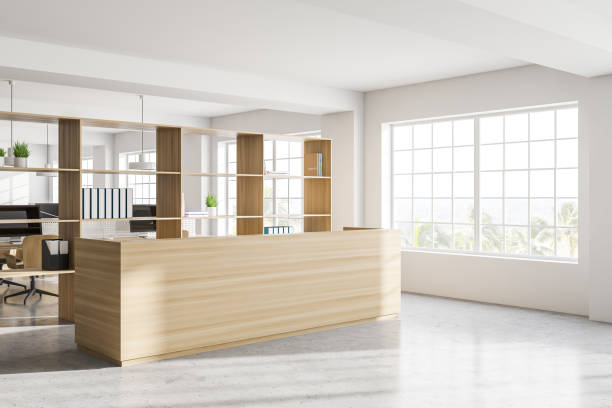 istock Modern white office corner with wooden reception 1287110765