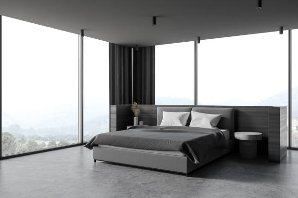 istock Modern wooden and gray master bedroom corner 1287110886