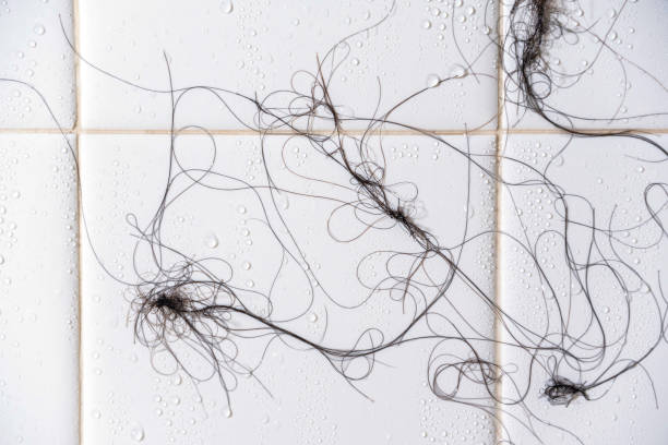 istock Losing Hair in Shower 1287112399